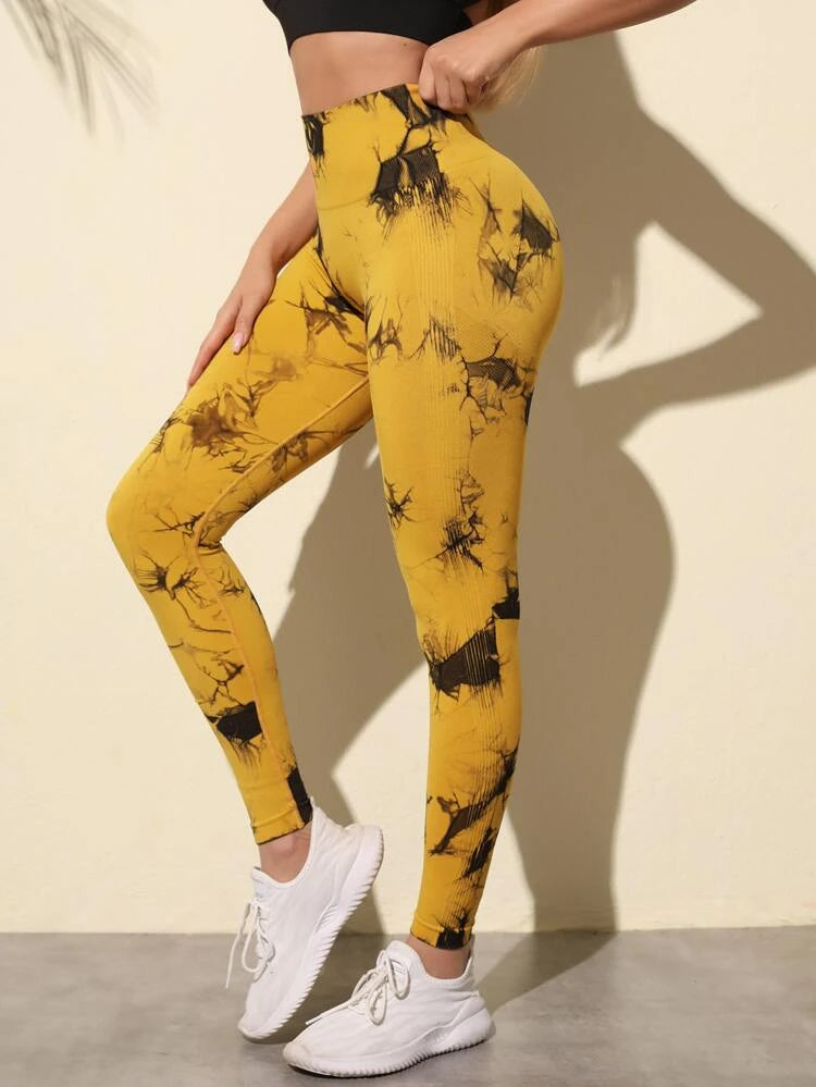 L116 Leggings tie dye amarillo con negro
