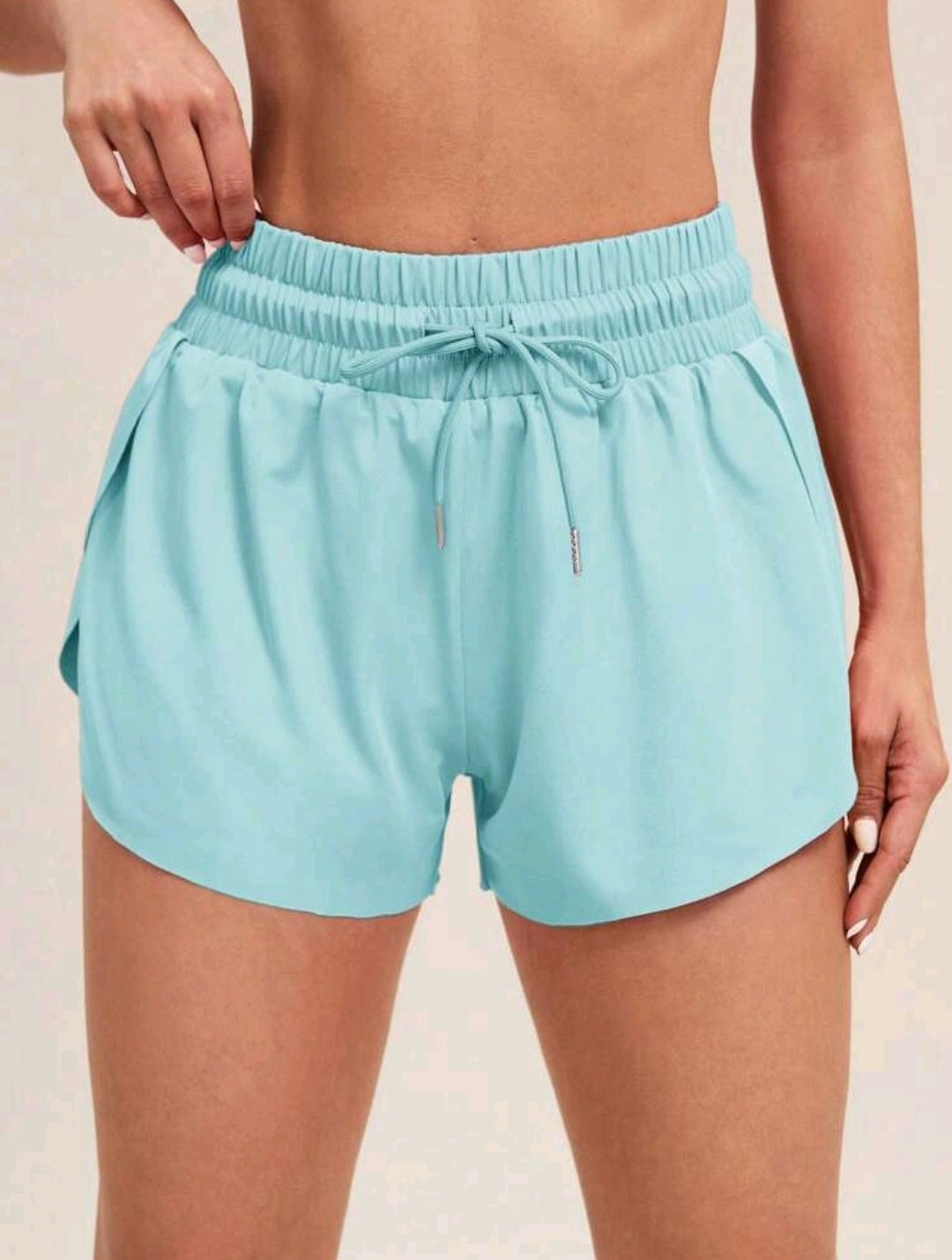 S126 Short verde menta de lazo con bolsa para cel