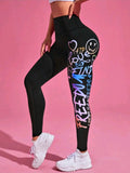 L148 Legging negro con grafitti multicolor en lado izquierdo