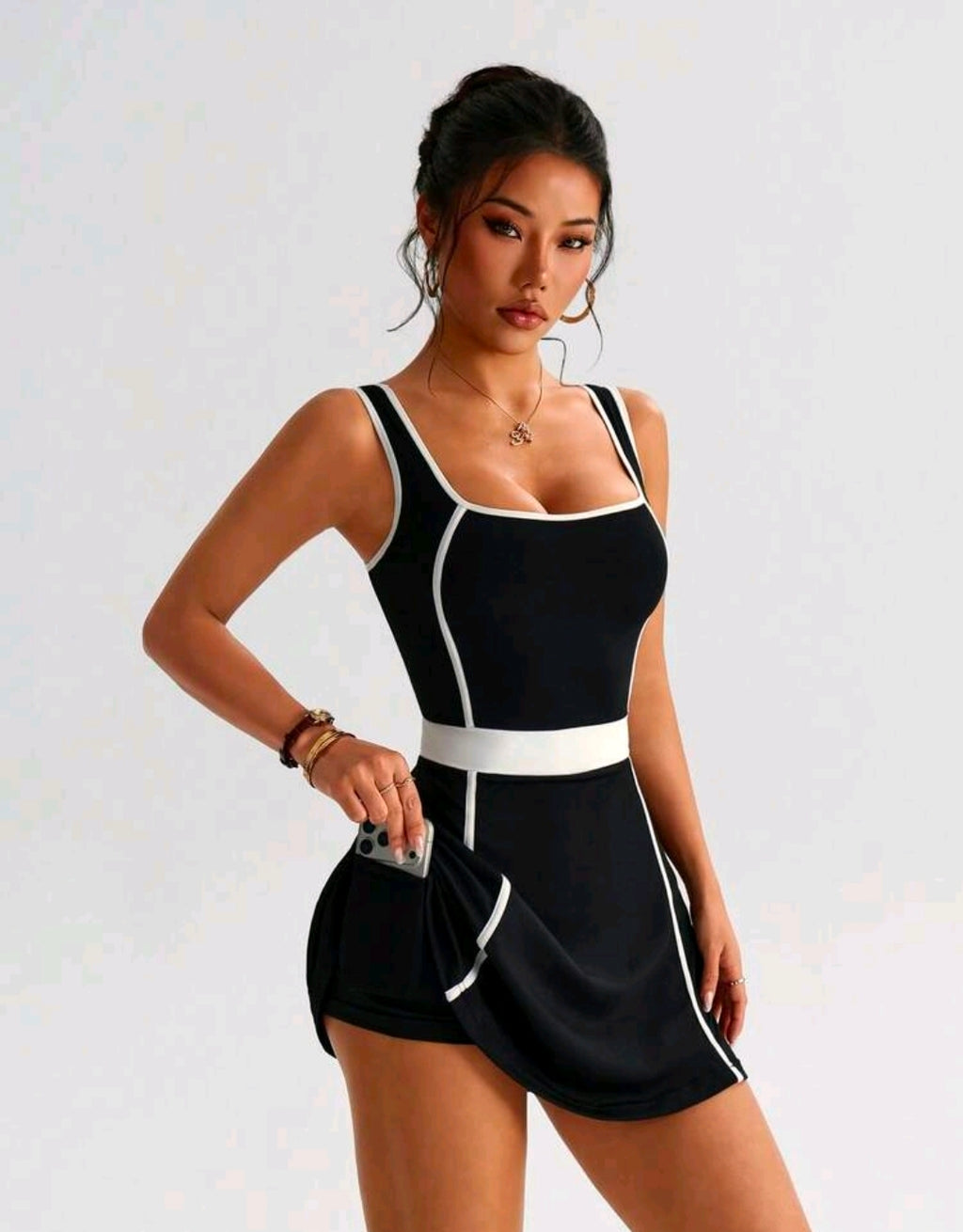 SS179 Enterizo vestido negro con línea gruesa diagonal y tirantes blancos