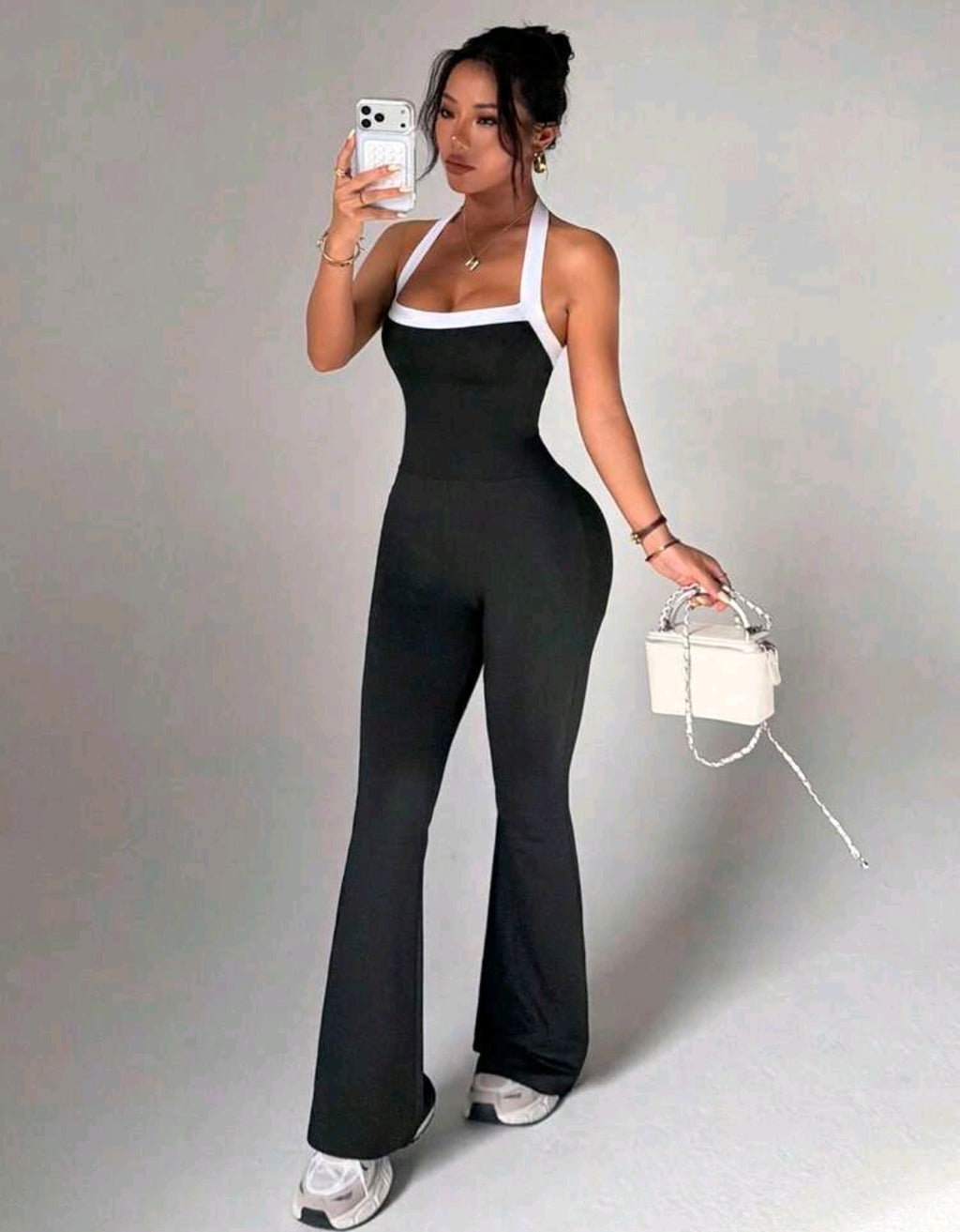 SS181 Enterizo negro acampanado