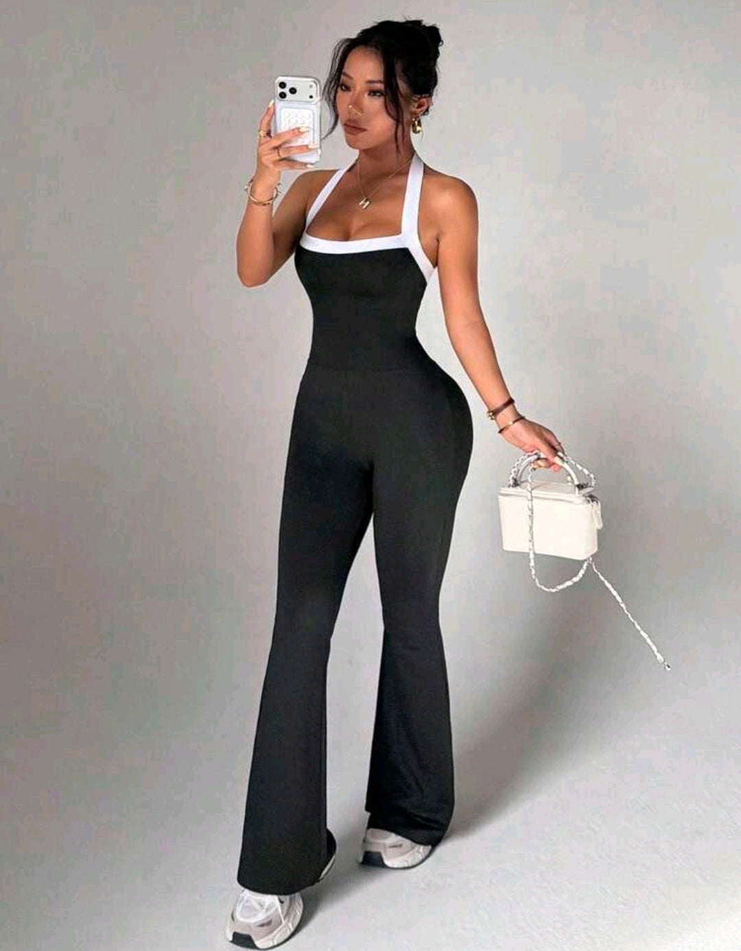 SS181 Enterizo negro acampanado